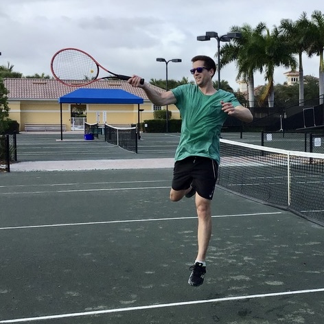 Me jumping on a tennis court